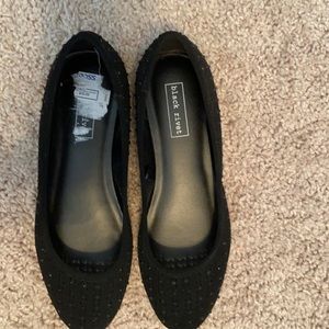 Black Rivet flats with black sparkles.